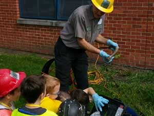 Man holding a plumbing tool - plumbing in Libertyville, IL