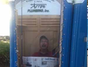 Man reading a newspaper -  arrow plumbing in Libertyville, IL