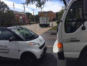 closer shot of the truck and mini car -  arrow plumbing in Libertyville, IL 