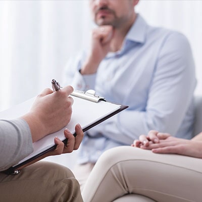 Women Writing Notes - Psychiatrist in Northeast, IL