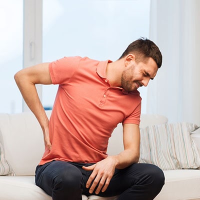 Man Suffering From Backache - Internal Medicine in Northeast, IL