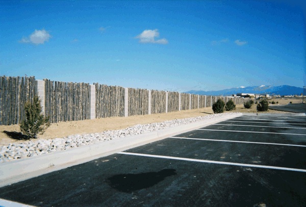 Professional Wooden Fence — Wood Fence Beside the Road in Albuquerque, NM
