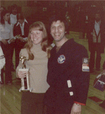 Our FIRST Martial Arts Instructor - Sensei Larry Malo (with Lynda & her 1st place trophy) - American Karate Systems