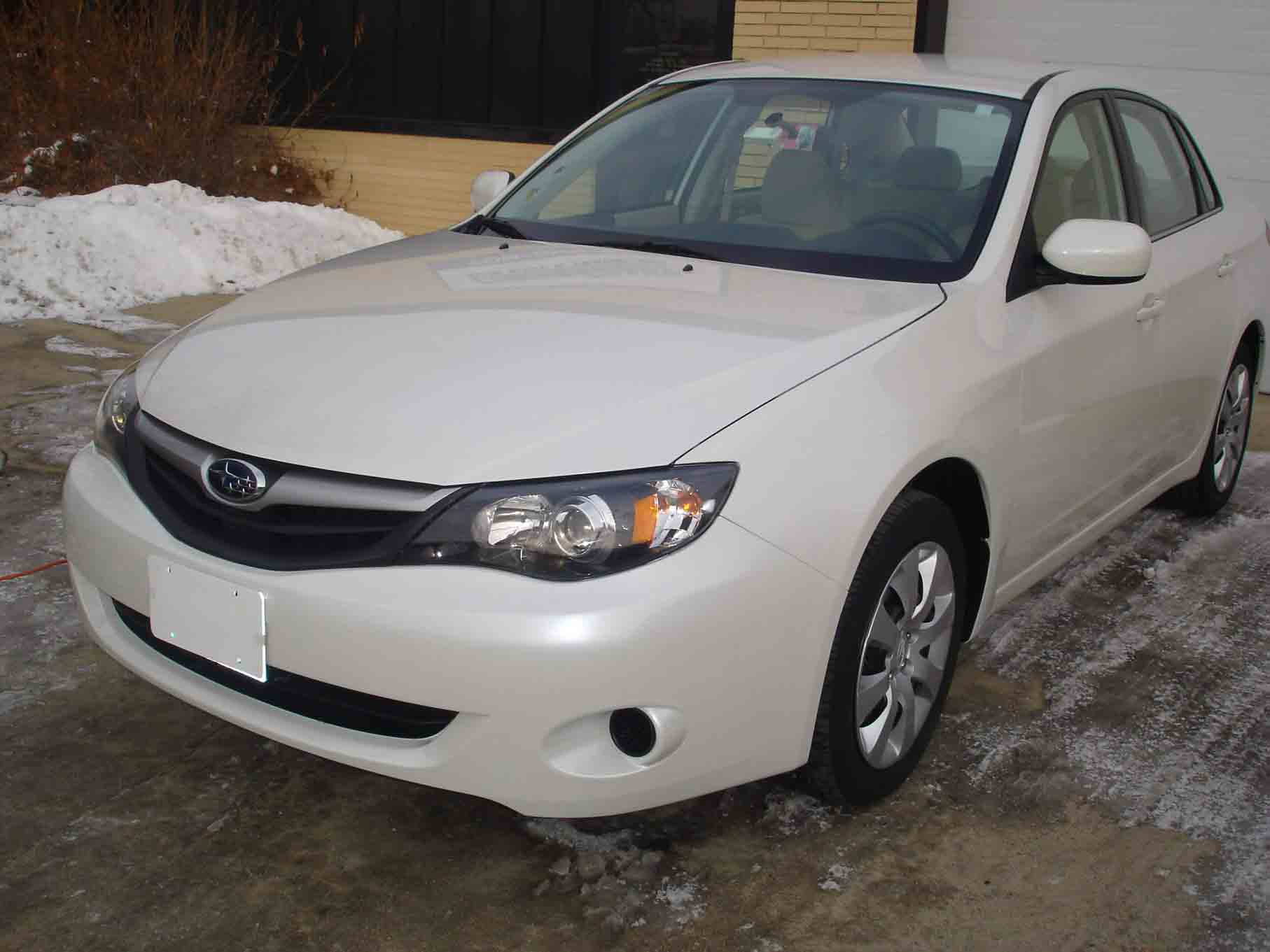 Top view of a white car - Auto body services in Bridgeview, IL